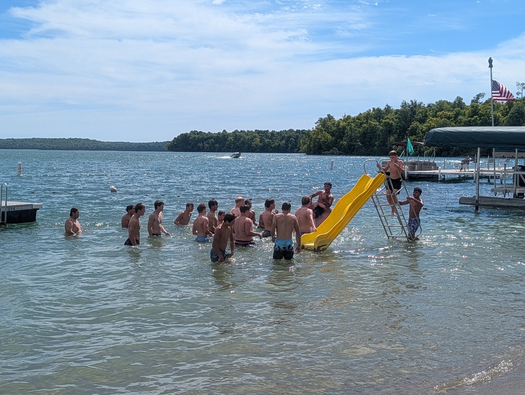 people in the lake