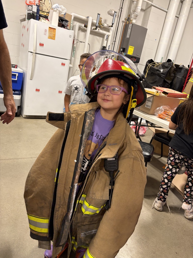 student with fire turnout gear on