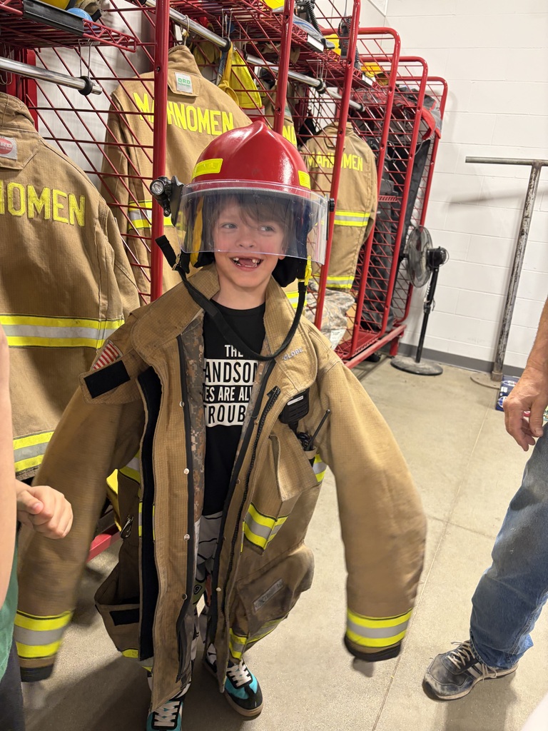 student with fire turnout gear on