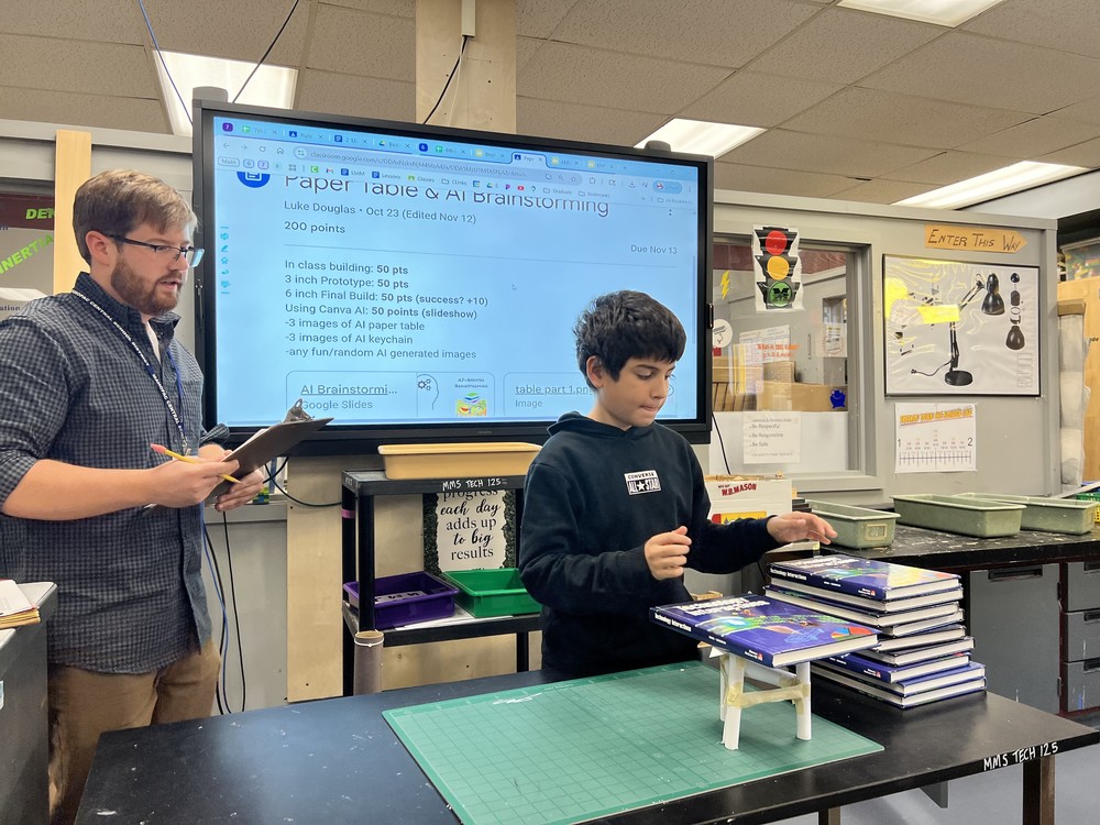 Sixth Graders Practice Engineering Skills on Paper Table Project