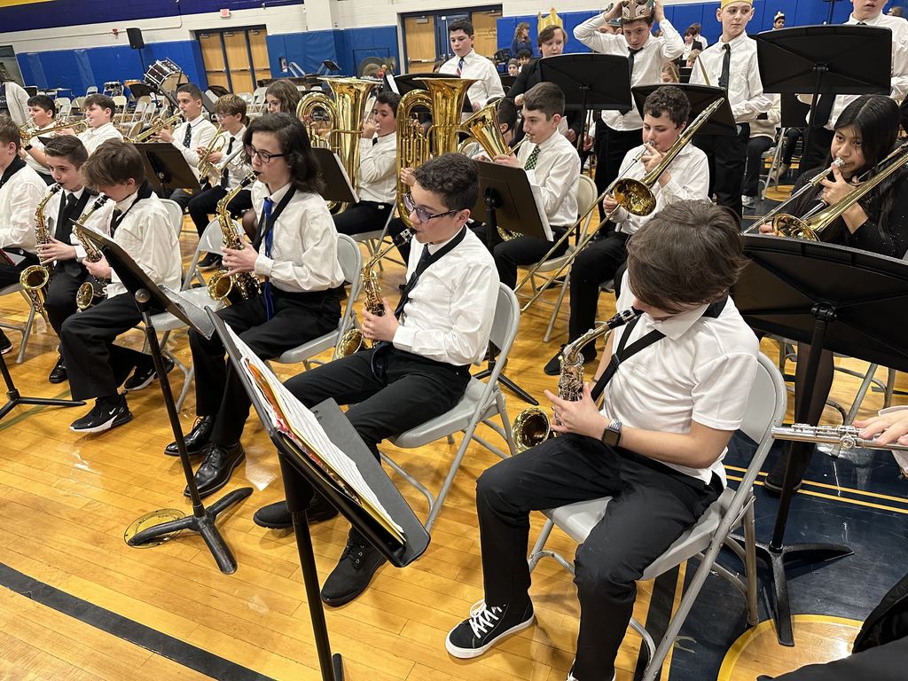 Students playing brass and wind instruments