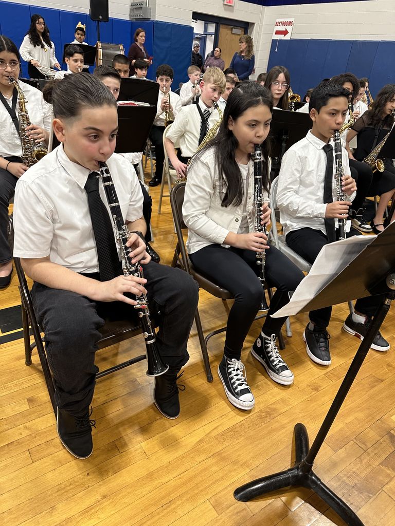 Students playing the clarinet