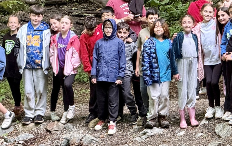 Fulmar Road Fourth Graders Release Trout Into Local Stream