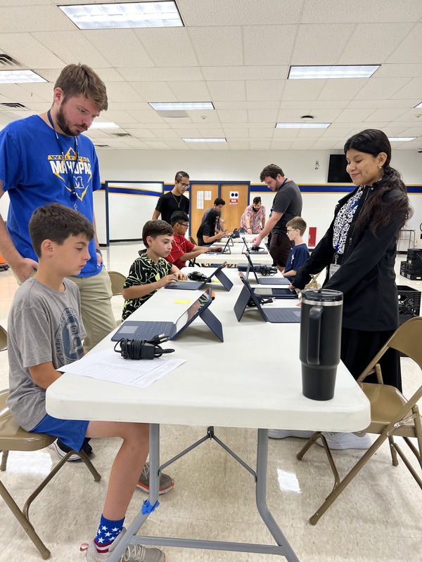 Sixth graders receive their iPads for the school year