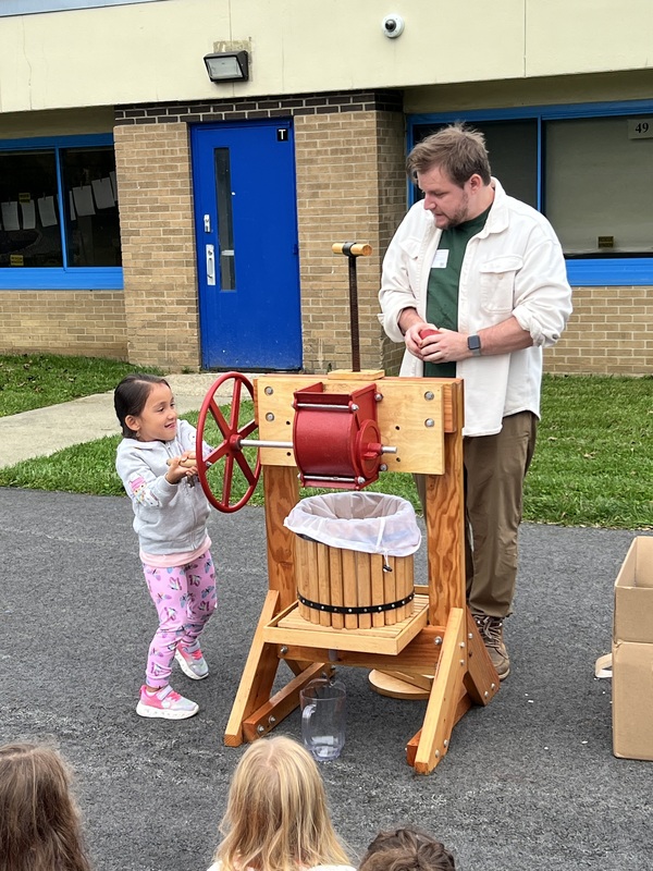 Kindergartners at Austin Road Learn How to Make Cider
