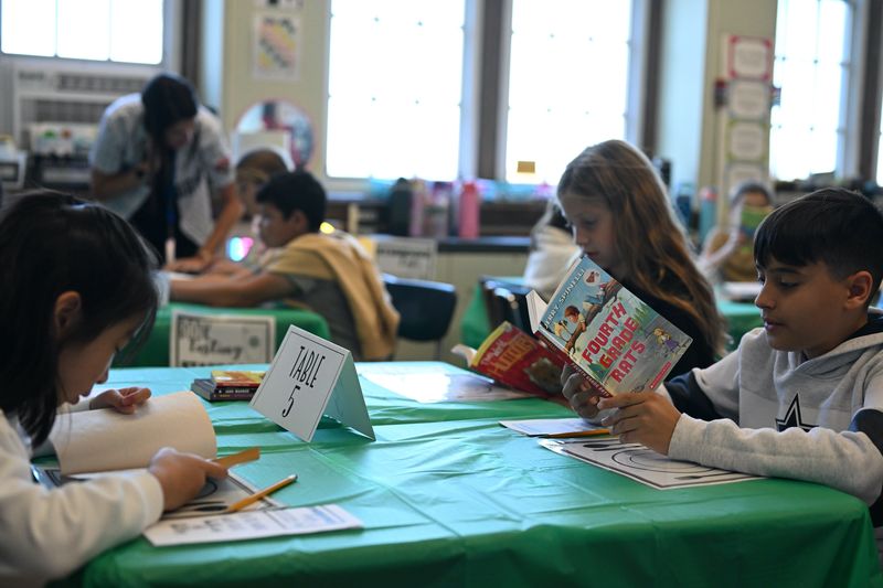 Fourth graders in Robin Ambrosi’s class at Lakeview Elementary School recently stepped into their classroom and found it transformed into a cozy café for a special reading event called “Starbooks Café.” 