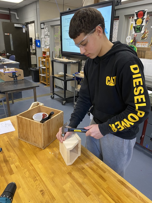 Eighth Graders Build Skills Through Woodworking Projects
