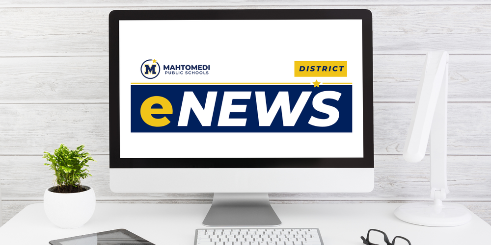eNews laptop with eNews photo on screen
