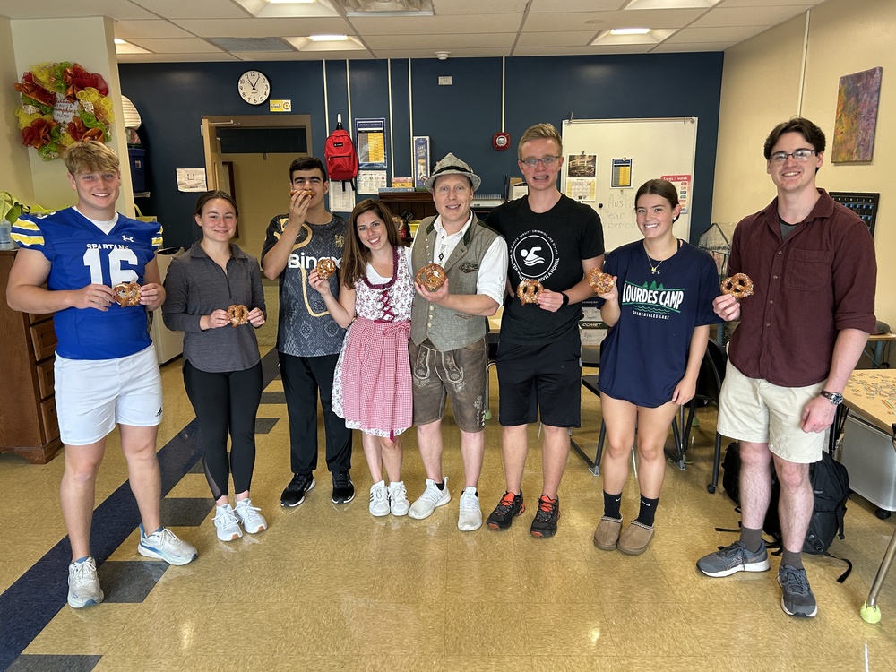 students holding pretzals
