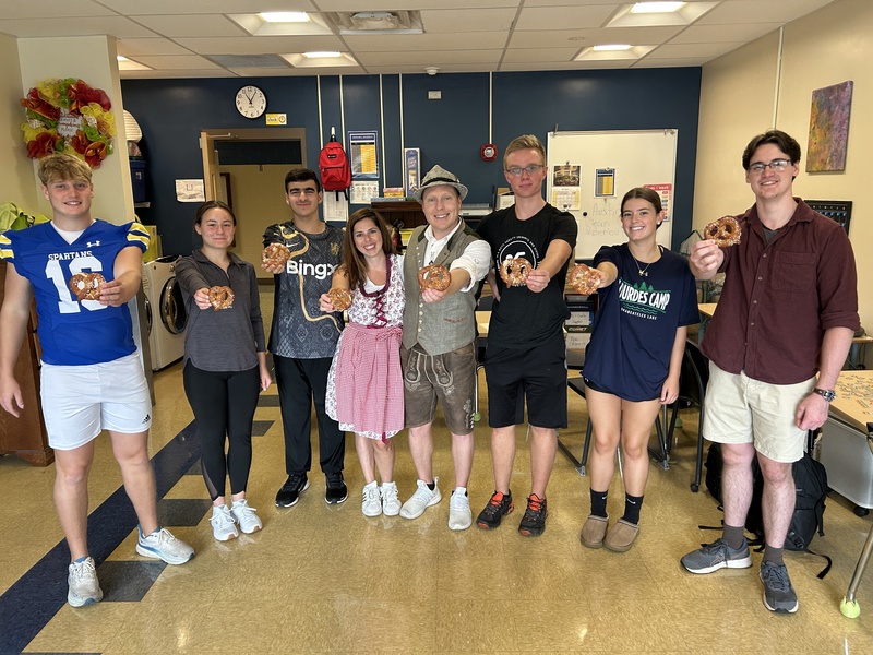 students holding pretzals