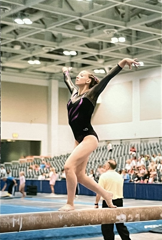 stout gymnast on beam