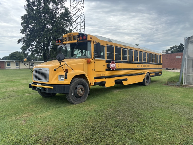 Driver side of the bus front corner