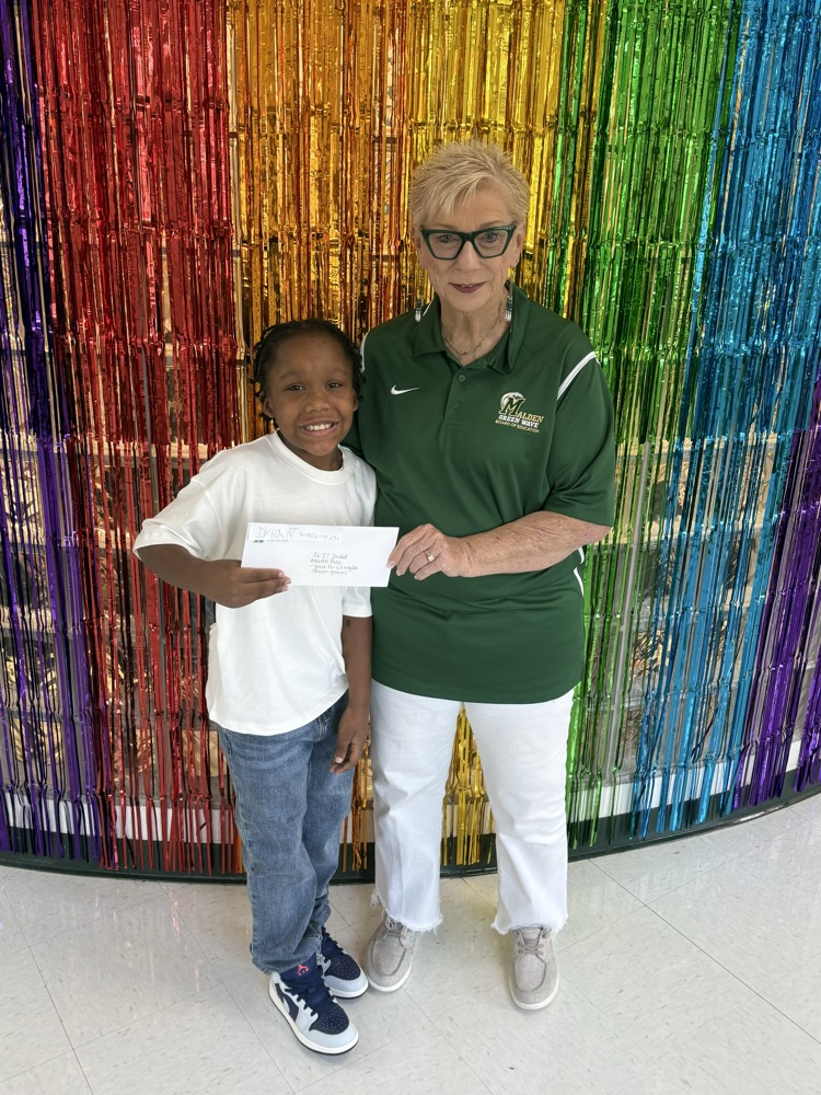 4th grader Dylan Washington was the winner of the free football tickets from the Open House Block Party!
