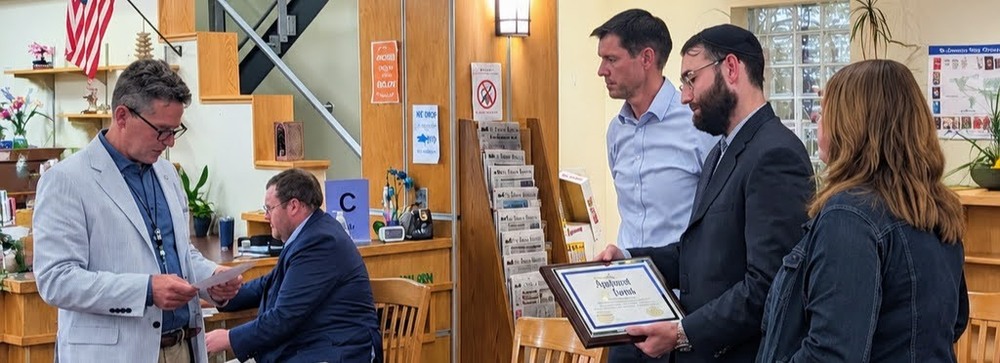 Teachers representing Team Innovate from the Middle School receive award from the New York State School Board Association