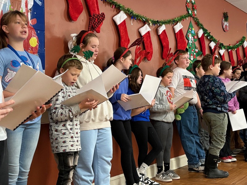 St. Joe's students singing at the Farrar Home