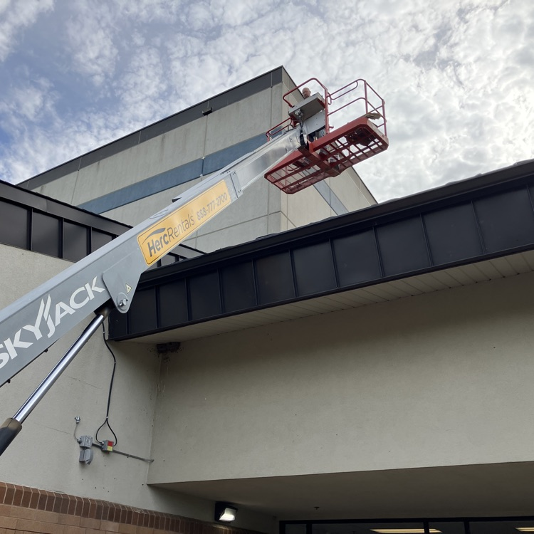 man in bucket lift 