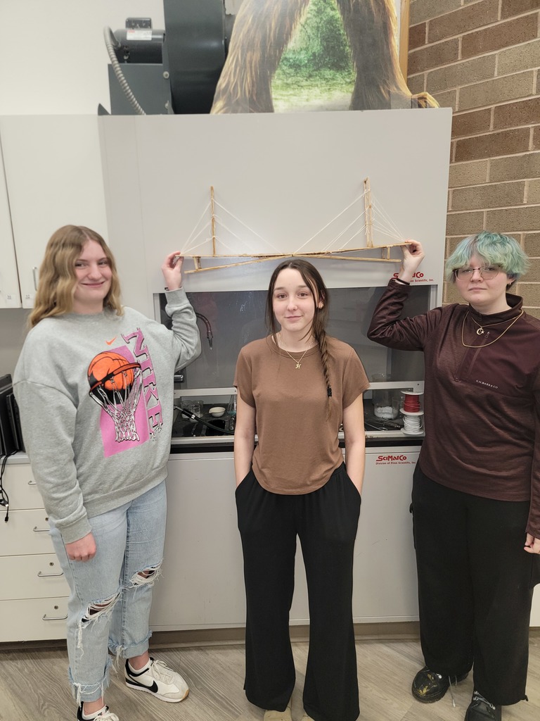 Group #2 posing with their bridge.