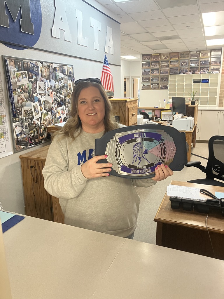 Tara holding her award for the Core 3. 