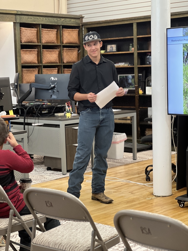 Travis presenting his project. 