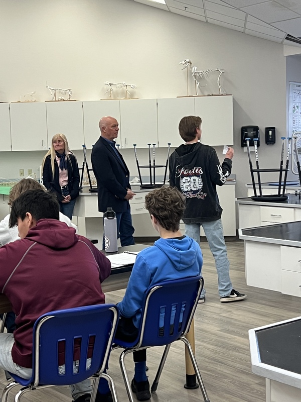 student visiting with the governor