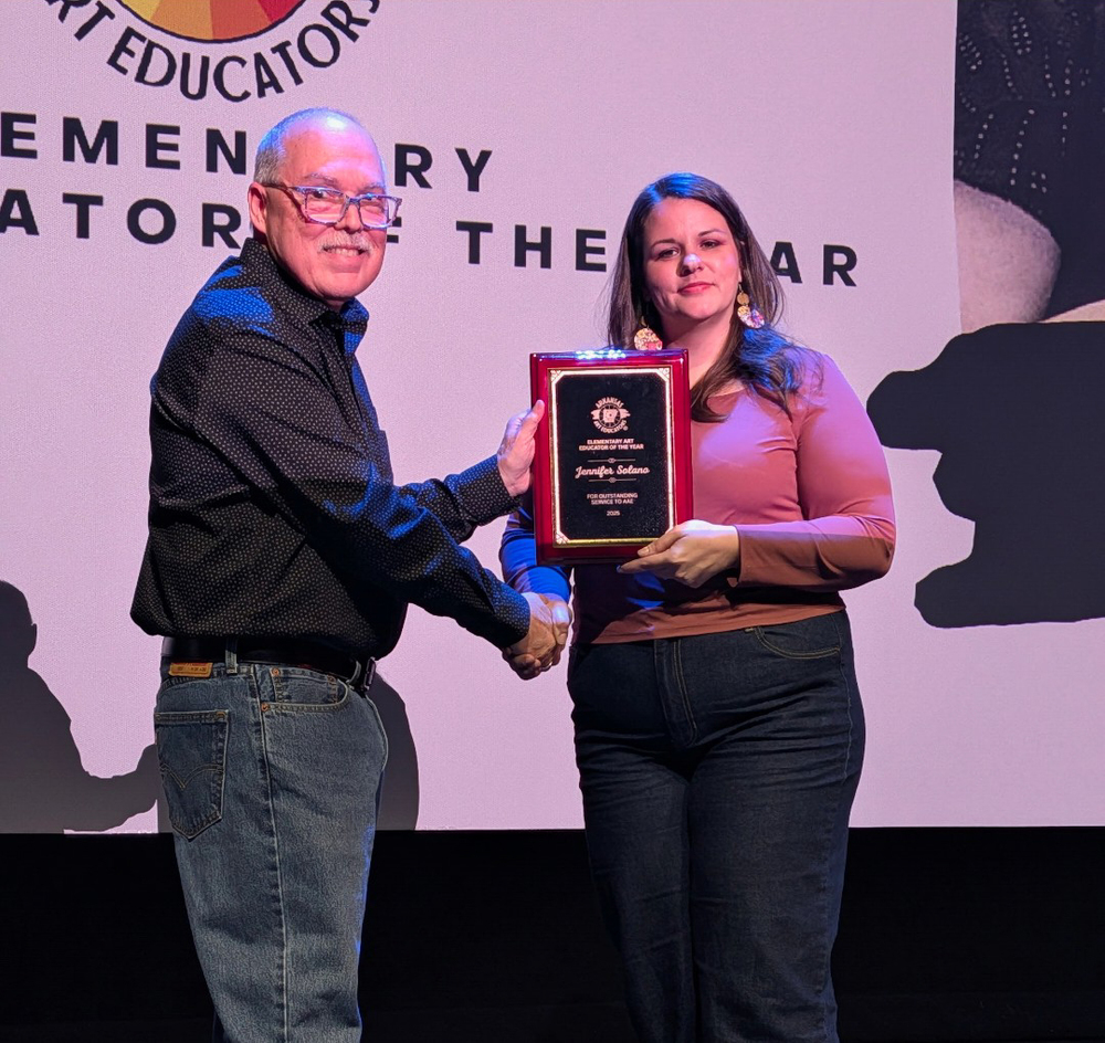 Art Teacher receiving award