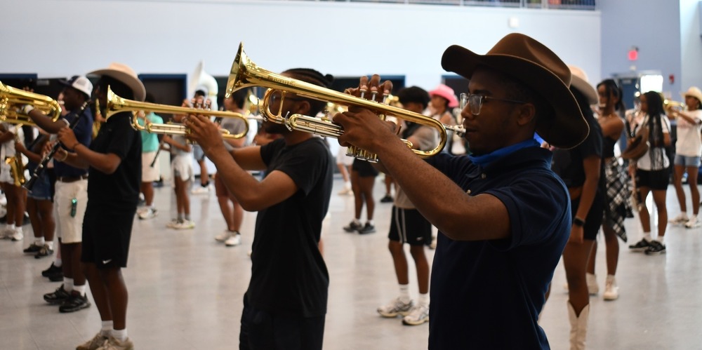 Marching Band student rehearsing