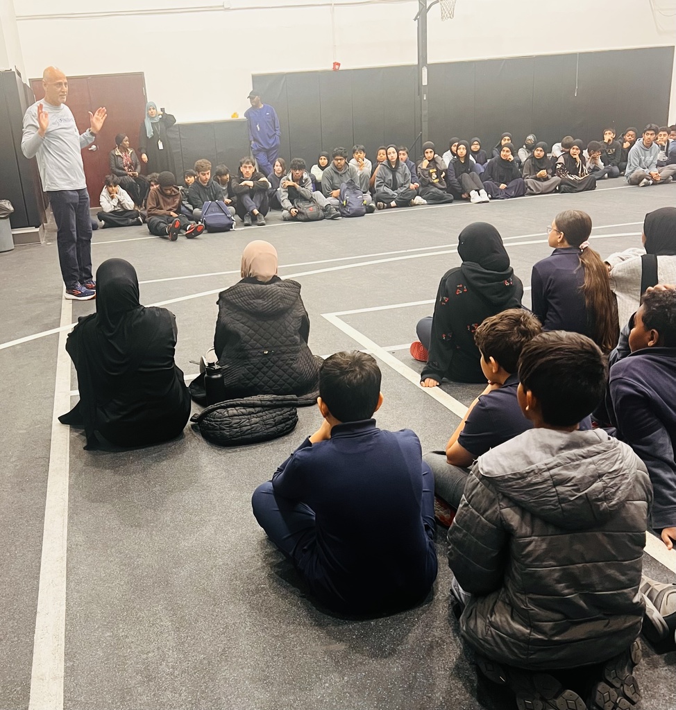 Dr. Sabri meets with students to discuss the 5K opportunity