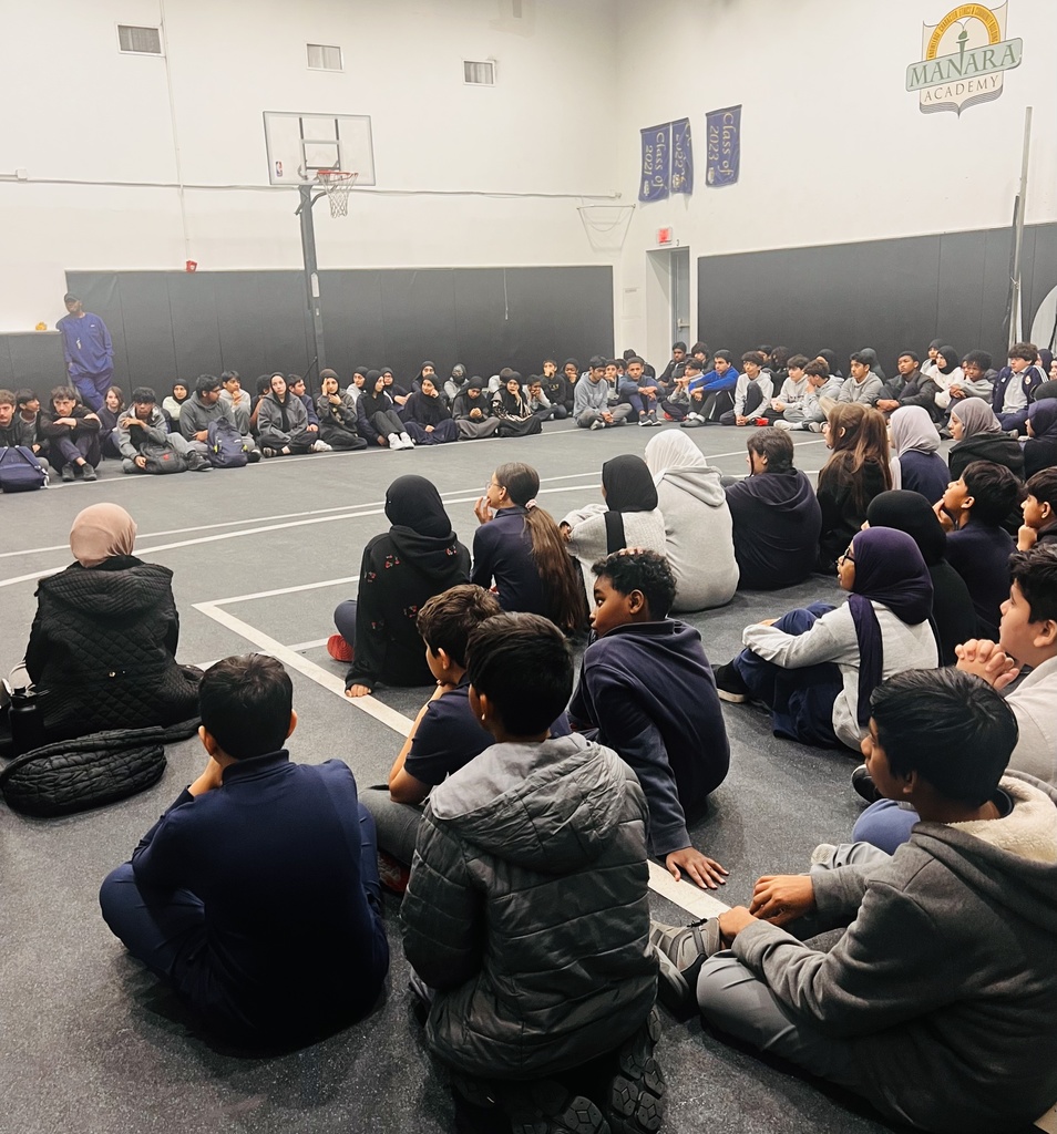 Dr. Sabri meets with students to discuss the 5K opportunity