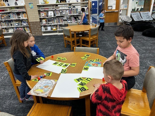 Mrs. Stormeon's and Mrs. Poppy's class did a Teen Number Scavenger Hunt in the Library today for Buddies!!  The 3rd graders helped the Kindergarteners match the teen number to the matching picture.  Everyone did a great job and had lots of fun!! 