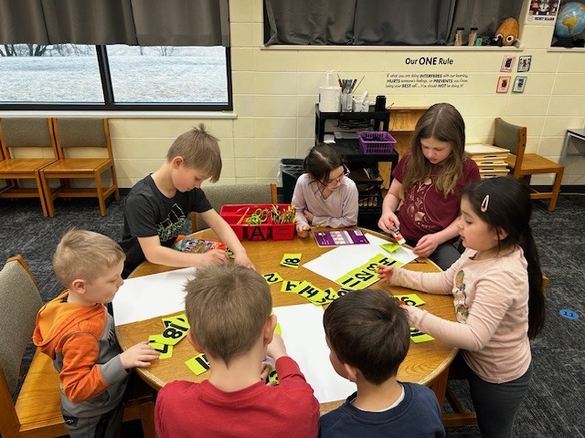 Mrs. Stormeon's and Mrs. Poppy's class did a Teen Number Scavenger Hunt in the Library today for Buddies!!  The 3rd graders helped the Kindergarteners match the teen number to the matching picture.  Everyone did a great job and had lots of fun!! 