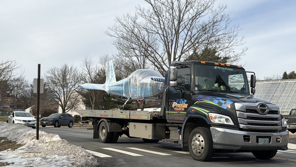 MST plane on flatbed truck 