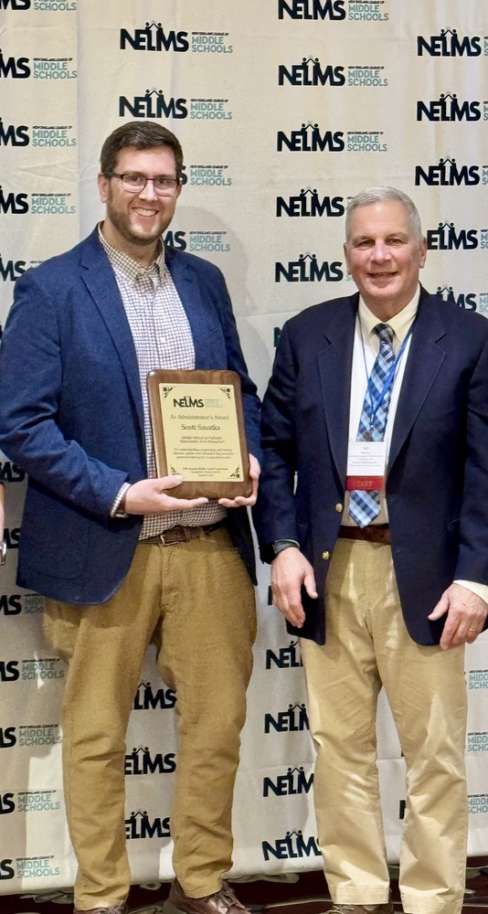 Scott Szuksta receiving award