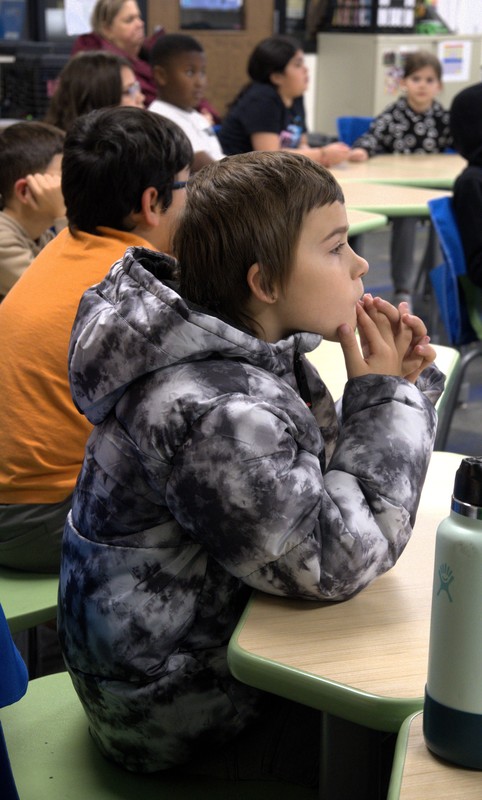 21st century student listens to presentation