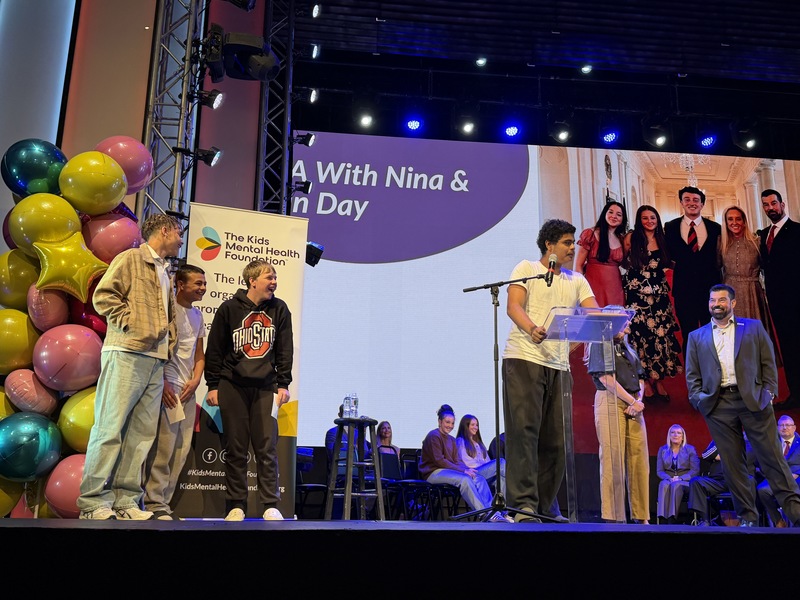 Students on stage with ryan day