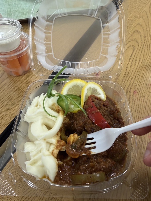 Lunch at Central High School showing stewed beef and mashed potatoes