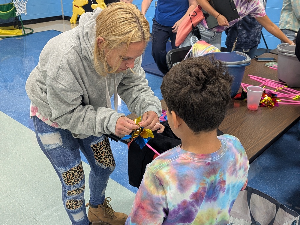 A student makes his pinwheel