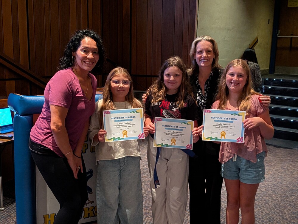 RES students receiving recognition certificates