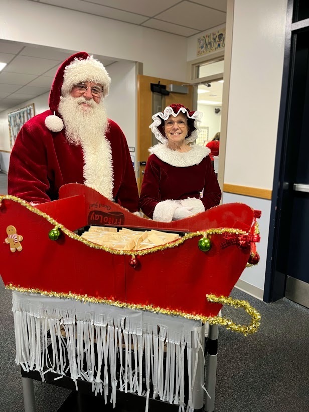 Holiday magic filled Manchester Township Elementary School this morning as Santa and Mrs. Claus, joined by Vice Principal Johnston, visited kindergarten and preschool classrooms. Students enjoyed cookies and milk, shared wish lists, and learned they are on the nice list.