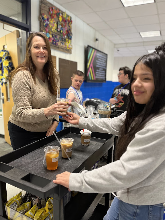 Students in the MTMS small group instructional class deliver coffee, treats, and smiles each Thursday! With handcrafted drinks, homemade baked goods, and their cheerful greeting, “Mustang Joe’s is here, we’re going to bring you cheer!” they’re building real-world skills and spreading positivity!