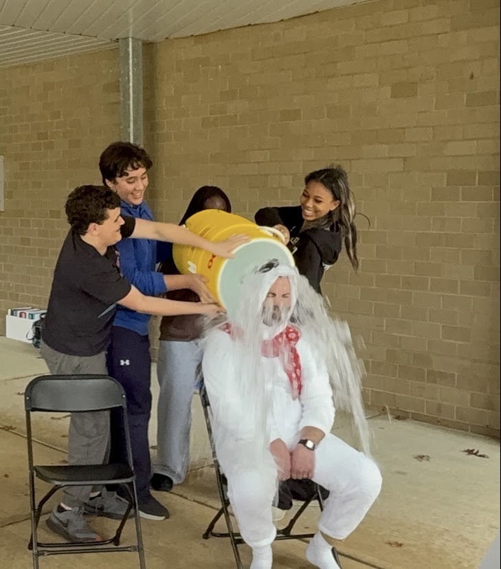 MTMS Student Council raised over $500 for staff participating in the Special Olympics Polar Plunge! During lunch, students voted with donations for the teacher they wanted to see take the ice bucket challenge. Mr. Morris “won” and faced a bucket of ice water from Student Council members!