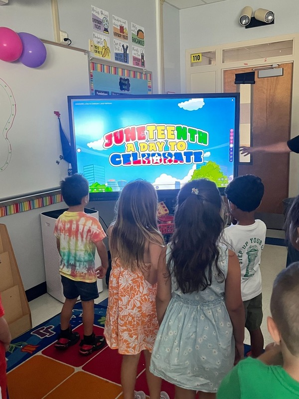 Students view a Juneteenth Interactive Presentation