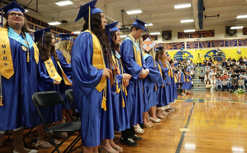 Graduates await their names to be called
