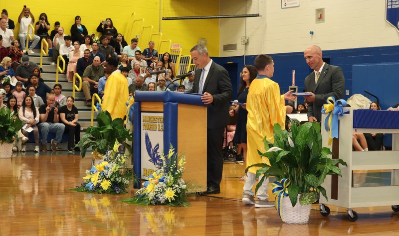 Graudates receive Diplomas 