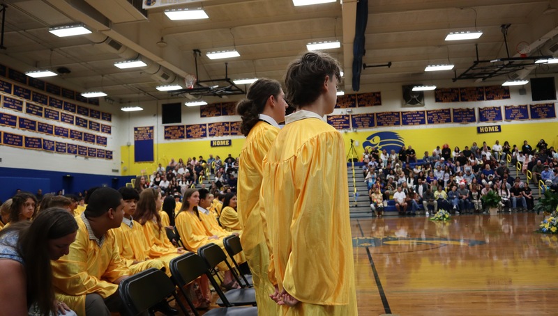 Students stand