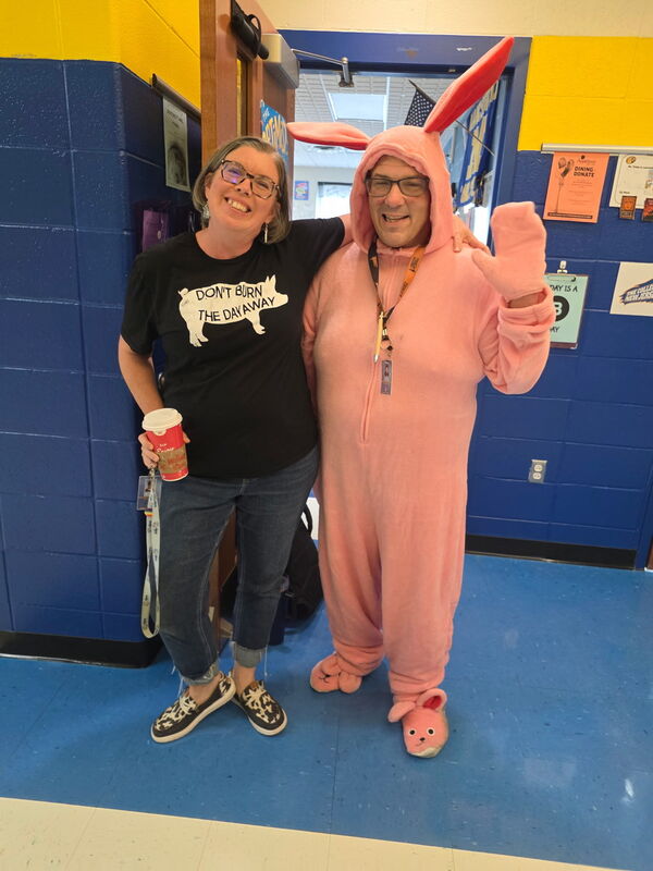 Staff wearing animal-themed outfits for Wednesday
