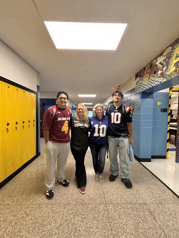 Staff and students wearing jerseys for Thursdays theme