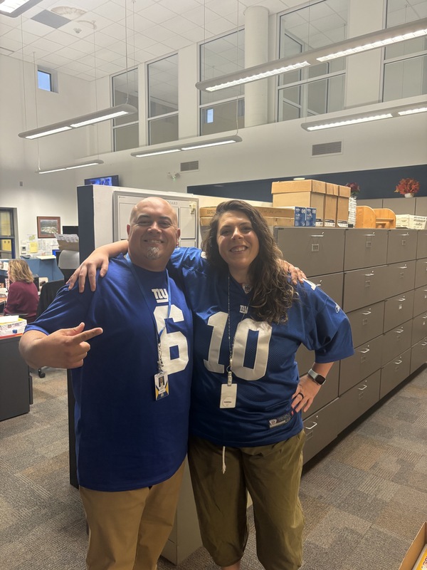 Staff wearing jerseys for Thursdays theme