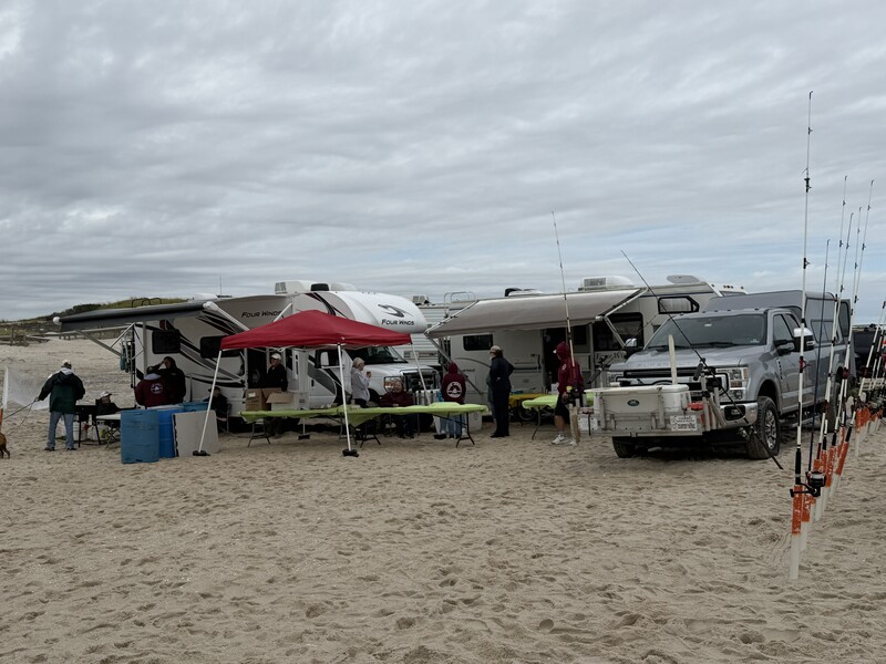Vehicles parked on beach for the NJBBA National Hunting and Fishing Day event