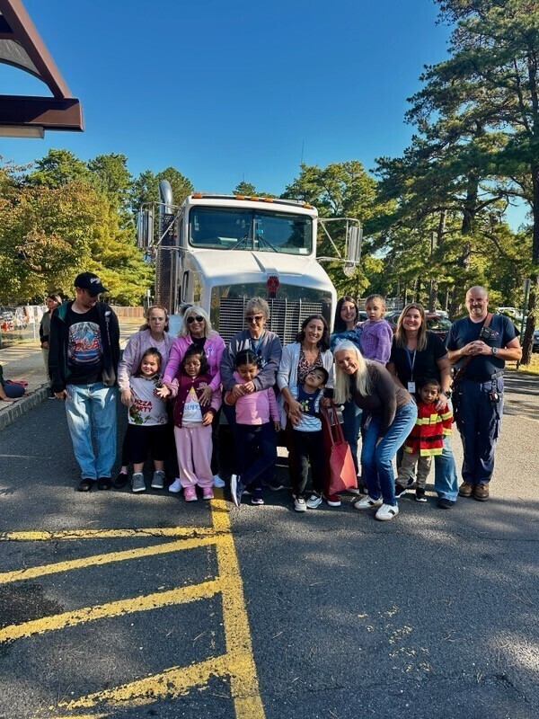 Group photo by firetruck