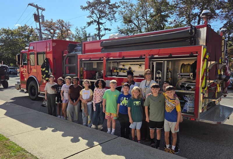 Group photo by firetruck